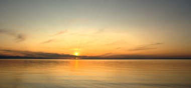 Sunset on Baikal lake clipart