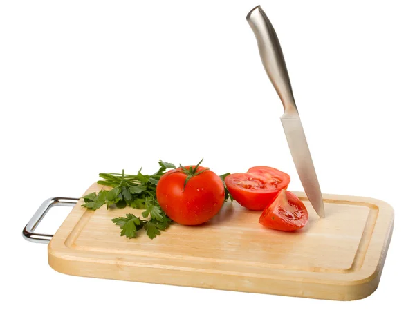 Tabla de cortar con tomate —  Fotos de Stock