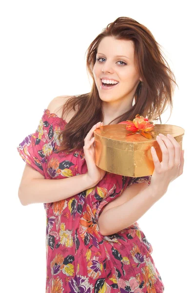 Cheerful young woman with gift gold box as heart — Stock Photo, Image