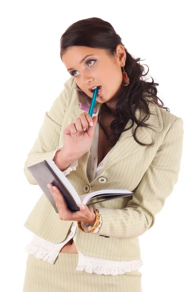 Businesswoman with cell phone and diary — Stock Photo, Image