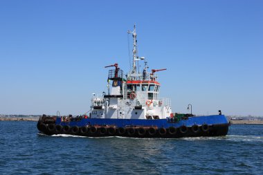 Tugboat at speed clipart