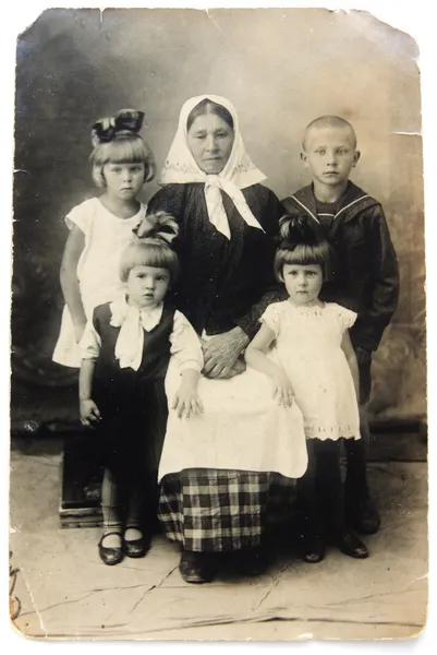 Ancient photo of grandmother with children — Stock Photo, Image