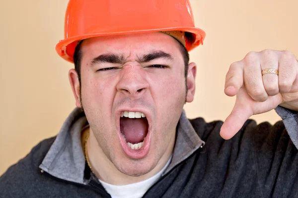 Rozzlobený stavební dělník — Stock fotografie