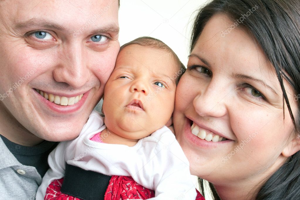 Excited Parents with a Newborn Baby
