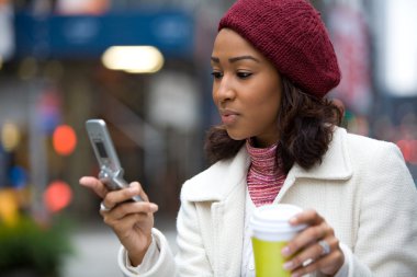 Business Woman With a Phone and Coffee clipart