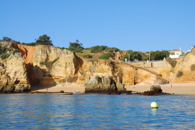 Beach Dona Ana in Lagos in the Algarve Portugal clipart