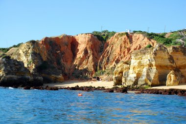 Beach Boneca in Lagos in the Algarve Portugal clipart