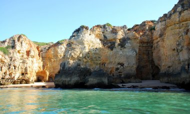 Beach in Lagos in the Algarve Portugal clipart