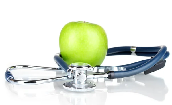 Stetoskop och grönt äpple — Stockfoto