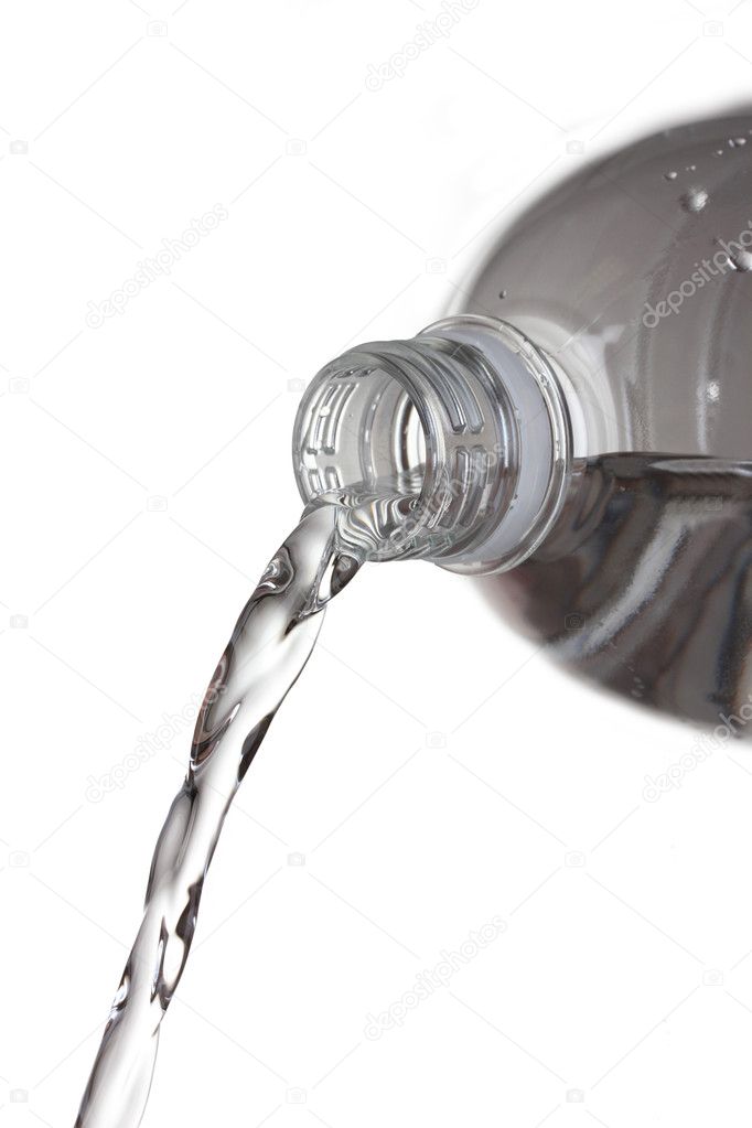 Fresh water pouring from plastic bottle isolated