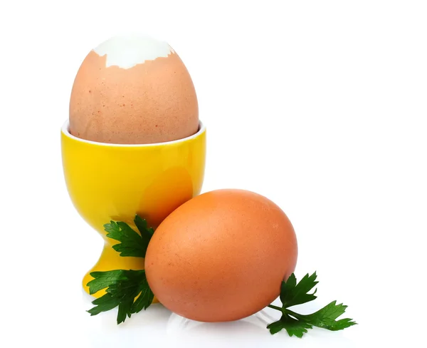Варені яйця в помаранчевій підставці і петрушці — стокове фото