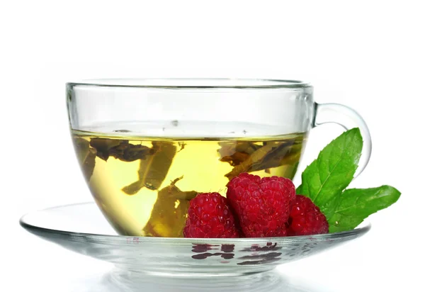 Zielona herbata w kubek przezroczysty i malina — Zdjęcie stockowe