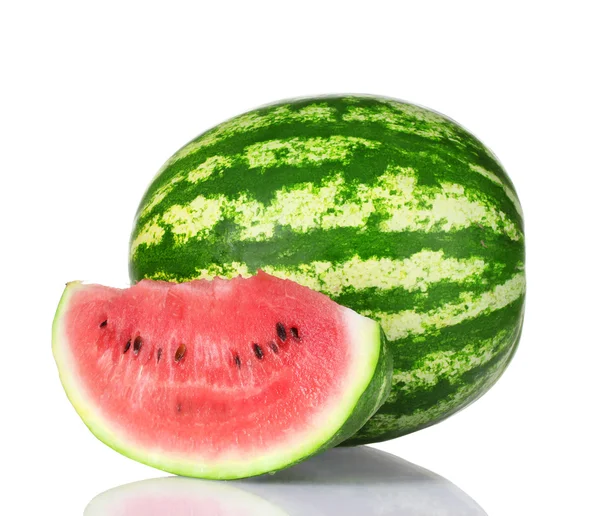 Reife Wassermelone und Scheiben — Stockfoto