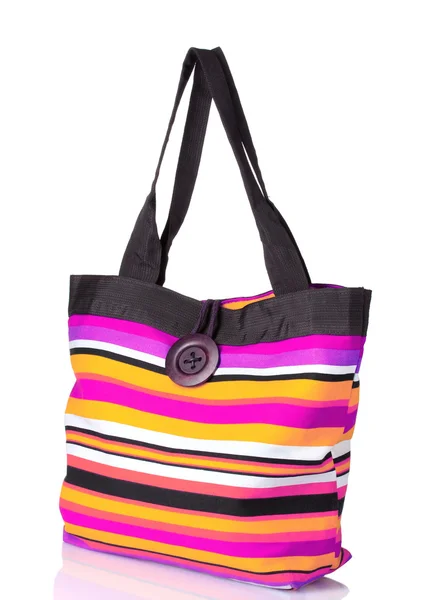 Zářivě pruhované plážovou tašku — Stock fotografie