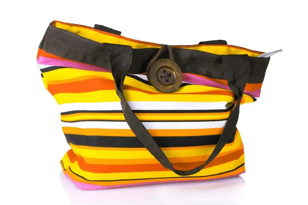 Zářivě pruhované plážovou tašku — Stock fotografie