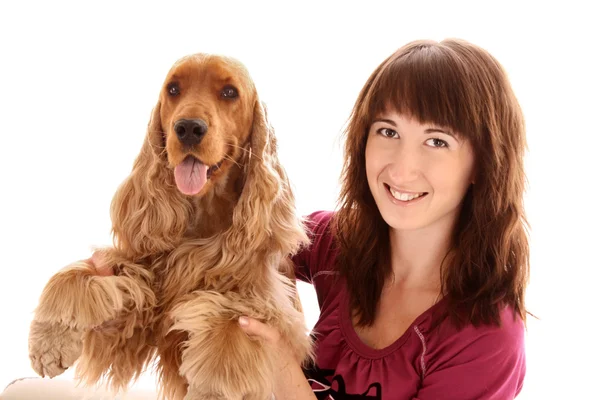 Young brown cocker spaniel and young woman on white background — Stock Photo, Image
