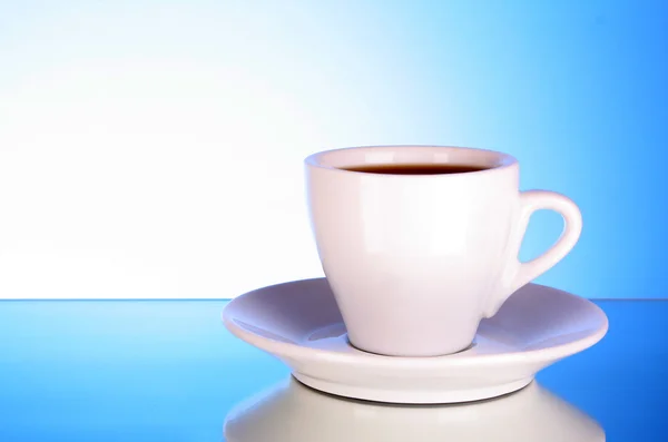 White coffee cup on a blue background — Stock Photo, Image