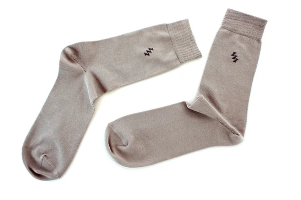 Šedé ponožky izolovaných na bílém pozadí — Stock fotografie