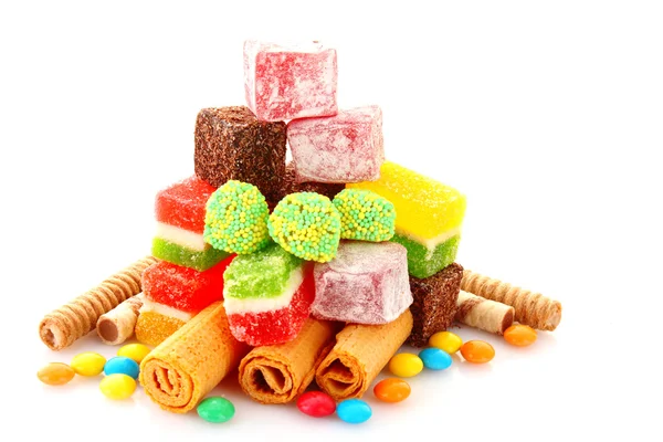 Colorful candies jelly on yellow background — Stock Photo, Image