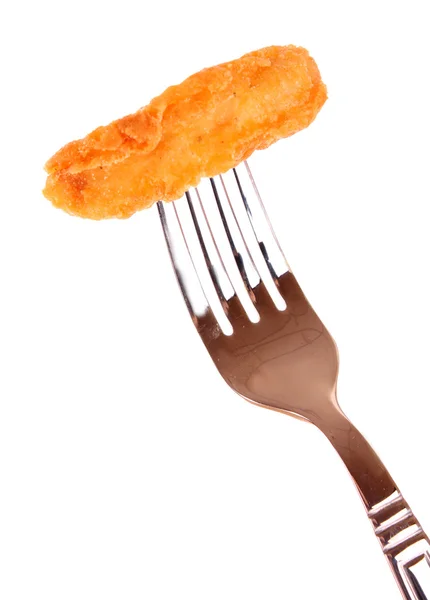 Carne frita no garfo em um fundo branco — Fotografia de Stock