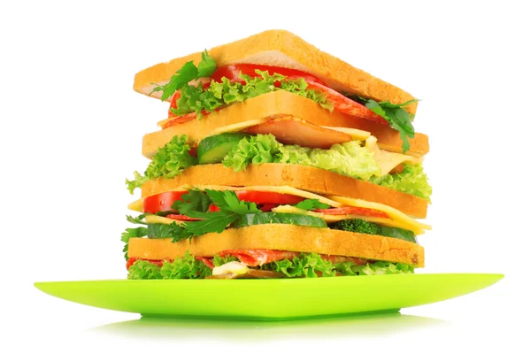 Enorme sandwich en glas tomatensap op witte achtergrond — Stockfoto