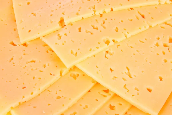 Yellow cheese on wooden background — Stock Photo, Image