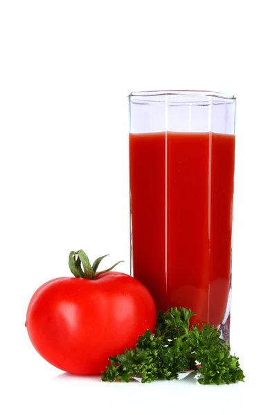 Sklenice čerstvé rajčatové šťávy a rajčat kulaté sklo na th — Stock fotografie