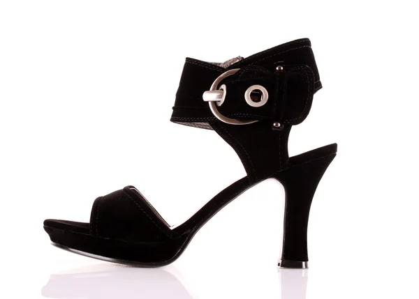 Женские сексуальные черные туфли на белом — стоковое фото