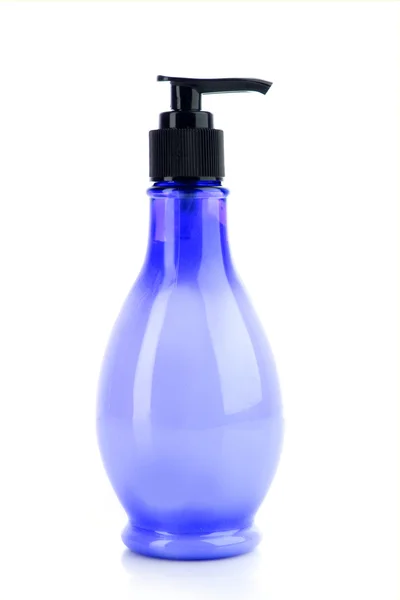 Blå tvål flaska på vit — Stockfoto