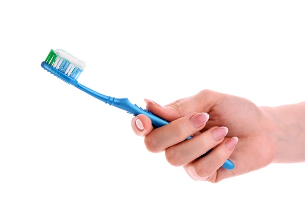 Pasta de dientes en el cepillo azul aislado con fondo blanco —  Fotos de Stock