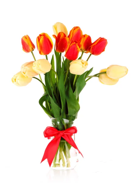 Isolated tulips in a glass vase — Stock Photo, Image
