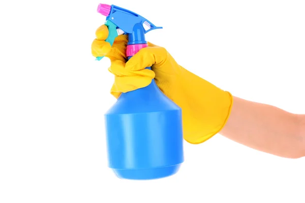 Mãos com spray sobre fundo azul — Fotografia de Stock