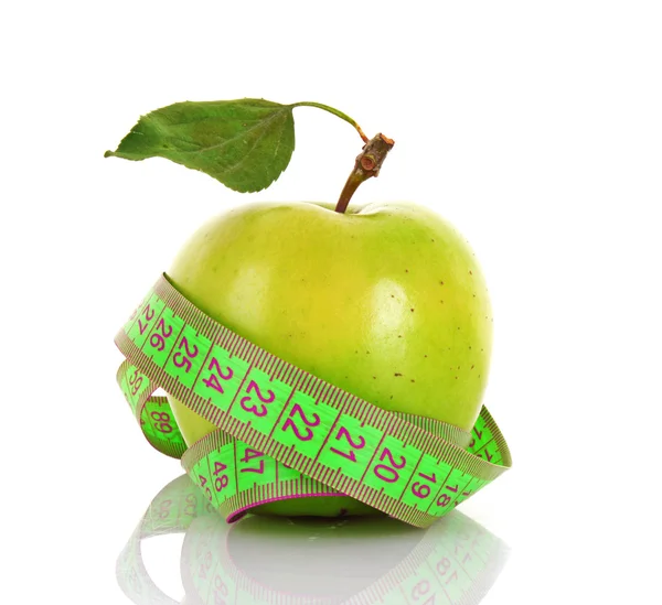 Yeşil elma ve şerit metre kapat — Stok fotoğraf