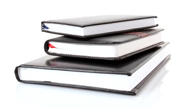 Beyaz zemin üzerinde üç siyah Notebook — Stok fotoğraf