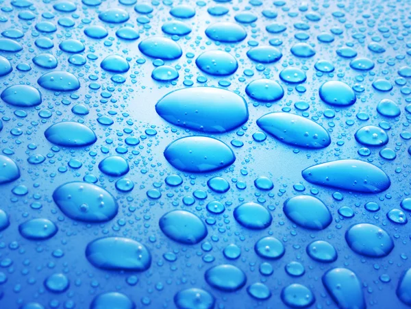 Agua azul gotas fondo — Foto de Stock