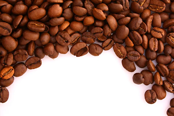 Granos de café sobre fondo blanco —  Fotos de Stock