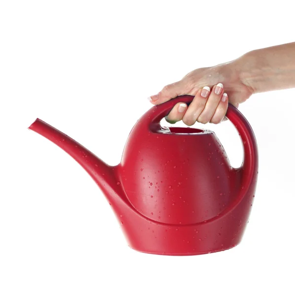 Hand with watering can isolated on white — Stock Photo, Image