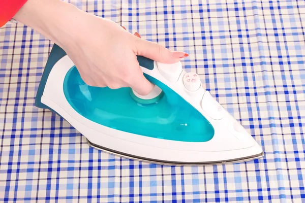Woman hand ironing — Stock Photo, Image