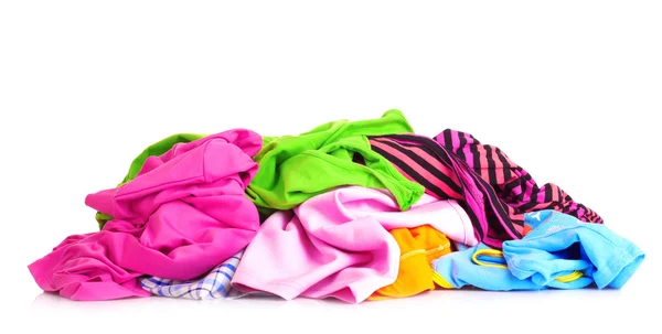 Big heap of colorful clothes isolated on white background — Stock Photo, Image