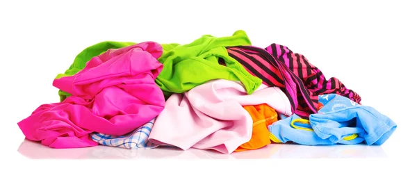 Big heap of colorful clothes isolated on white background — Stock Photo, Image
