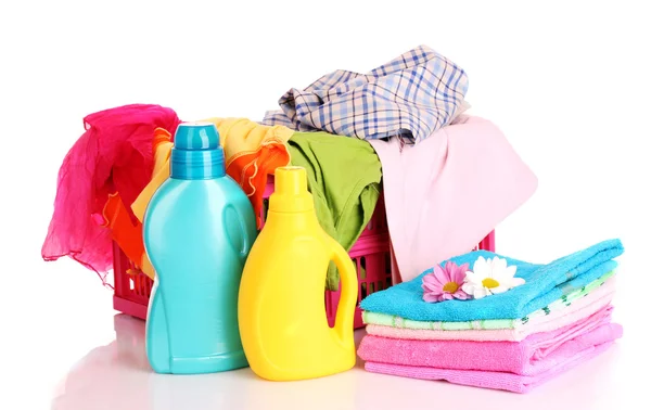 Colorful towels and liquid laundry detergent over white backgr — Stock Photo, Image