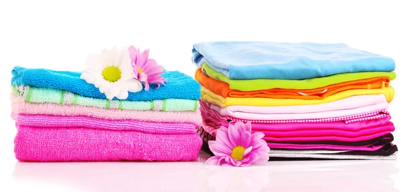 Stacked colorful towels on a white background — Stock Photo, Image