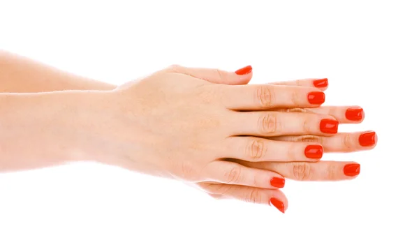 Mooie rode manicure geïsoleerd op wit — Stockfoto