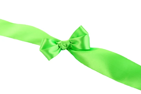 Green ribbon with bow on white — Stock Photo, Image