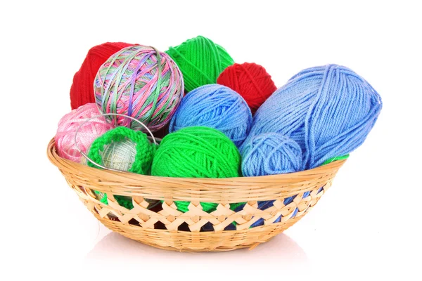 Balls of color knitting wool or yarn in basket on white — Stock Photo, Image