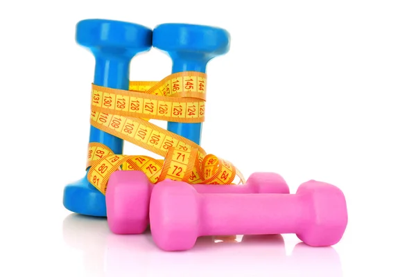 Dumbbells and tape measure on the white background — Stock Photo, Image