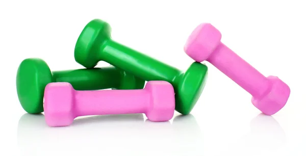 Dumbbells rosa e verde no fundo branco — Fotografia de Stock