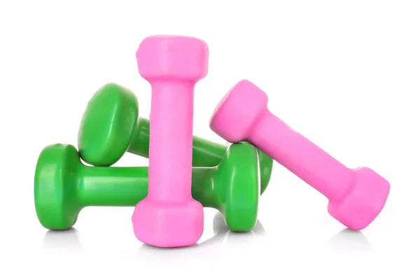 Dumbbells rosa e verde no fundo branco — Fotografia de Stock