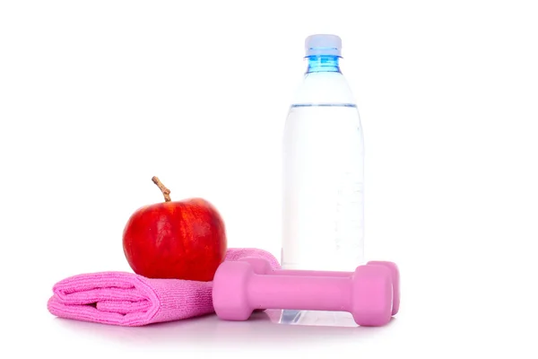 Blue bottle of water, apple and exercise equipment isolated agai — Stock Photo, Image