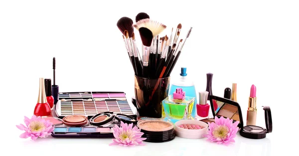 Many colourful woman cosmetics with flower on white white backgr — Stock Photo, Image